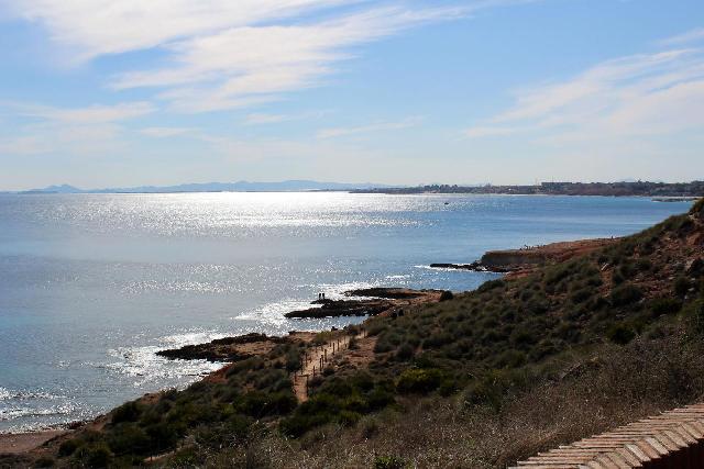 itsh 1774889592EKMIRW ref 1835 mobile 13 Cabo Roig beach at sunset Cabo Roig