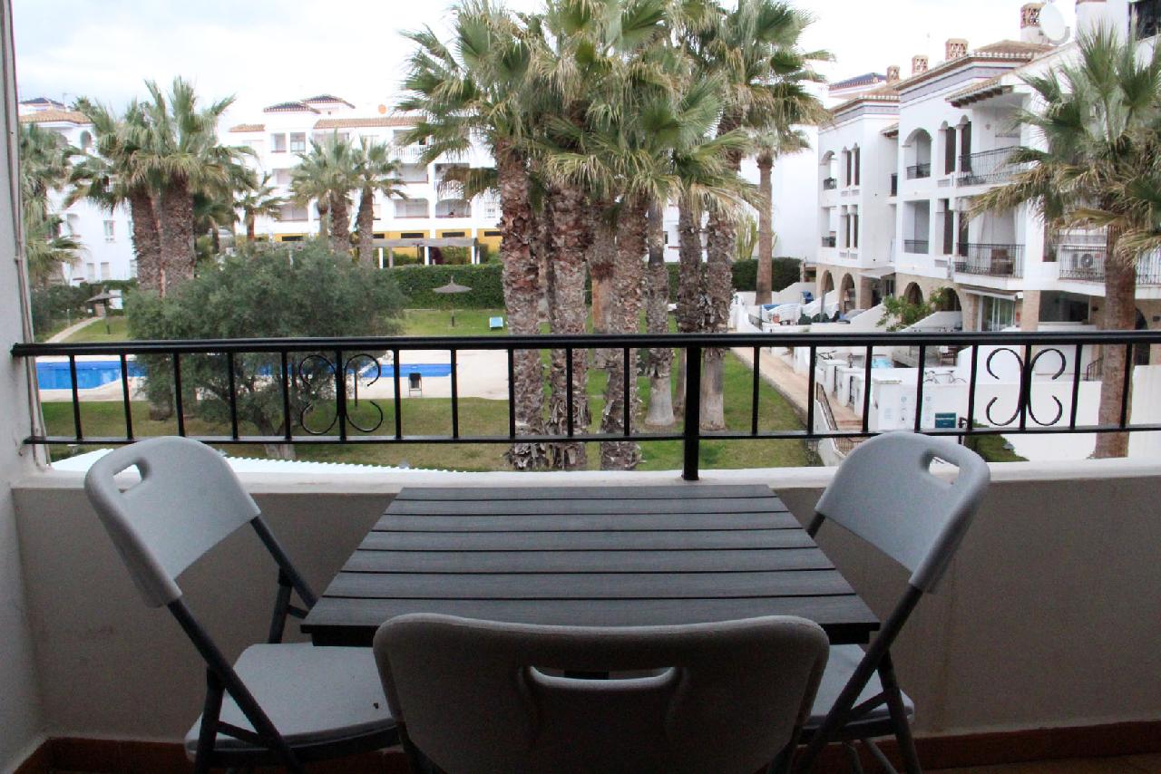 itsh 1740572132BIWTXU ref 1829 mobile 6 Balcony with views to the pool Villamartin Plaza