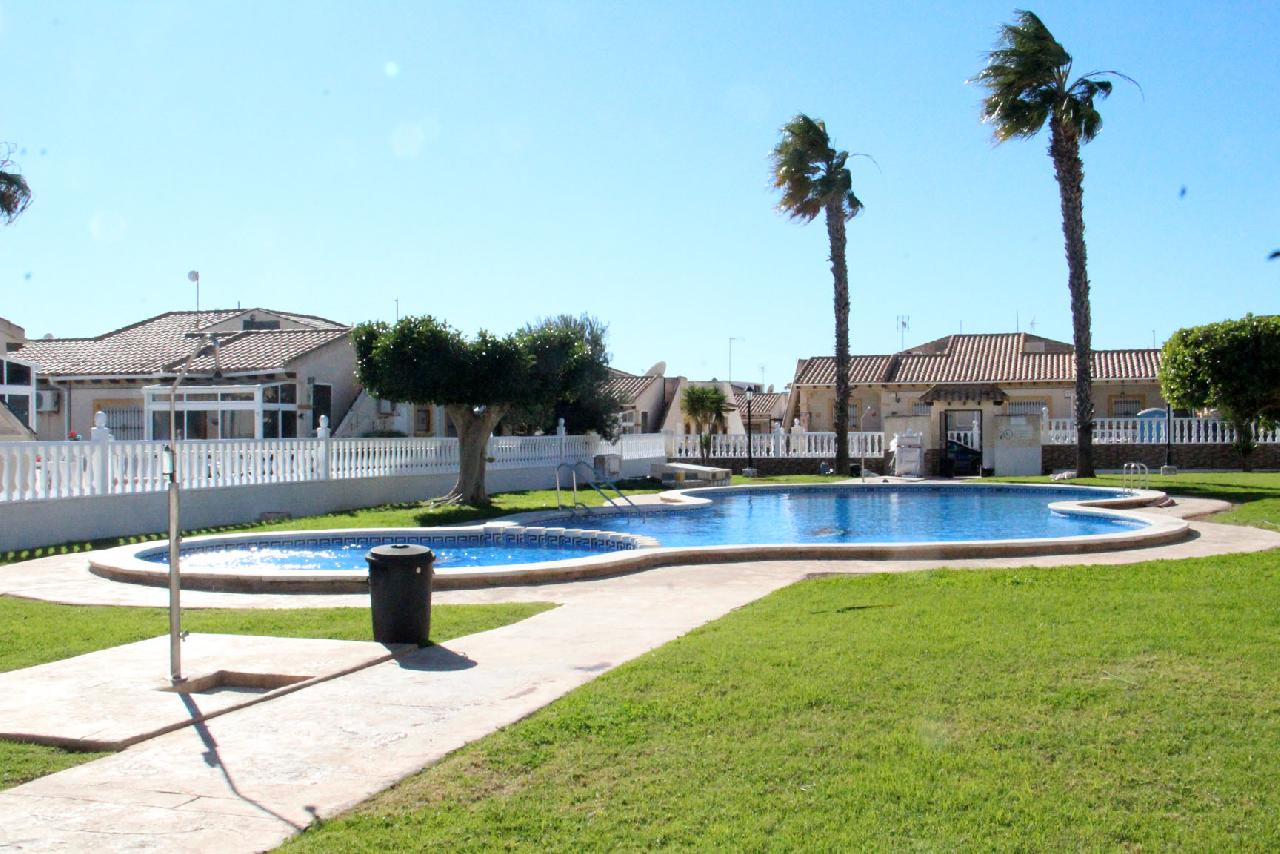 itsh 1675446637HFBCEI ref 1800 mobile 2 Lovely communal pool Cabo Roig